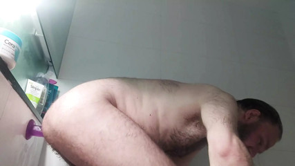 Hairy chastity locked bear fucks his hole with ten inch dildo