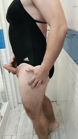 Tranny wearing adidas one piece swimsuit thumbnail
