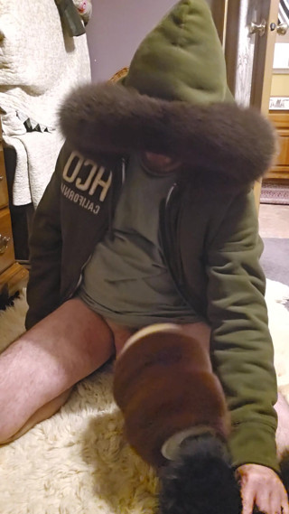 In my favorite furry hood getting serviced my fur. Machine