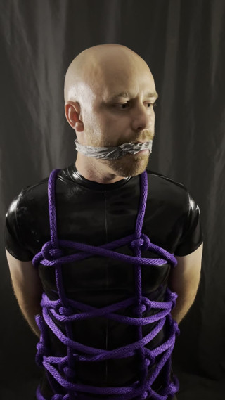 Rubber gimp tied up and ready to serve