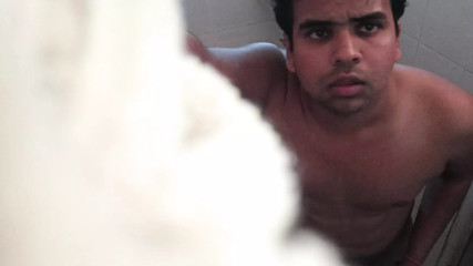 Nude peeing in bathroom with water