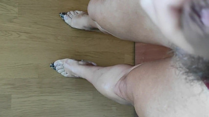 Joana V0mit showing legs and cock w blue dress and heels