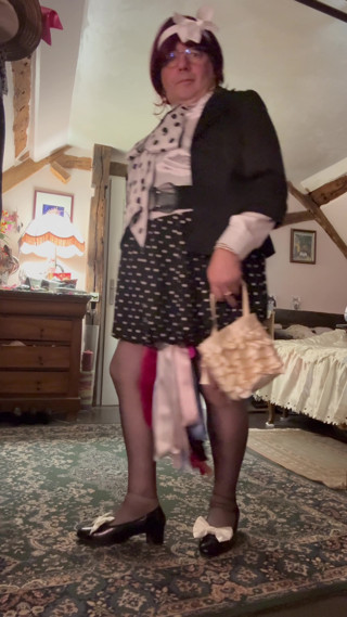 Dressed in a little polka-dot skirt for an evening out thumbnail