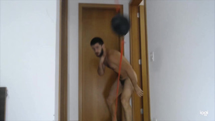 hot skilled fighter punches bag naked