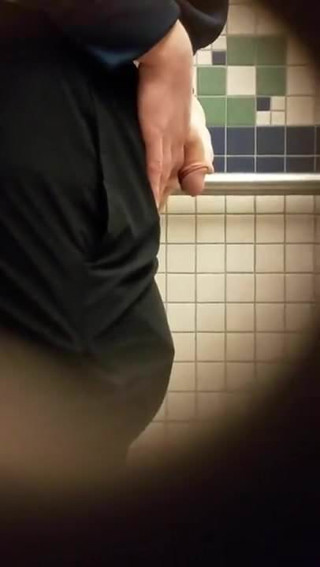 College guy taking a piss!
