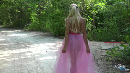 Blonde and Beautiful Angeles Cid showing off her amazing big tits and big ass in the street thumbnail
