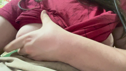 The doll is showing her bare breasts.