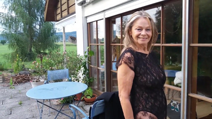 A Mature Woman Shows off Her Figure Outside in a Lace Bodysuit!