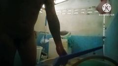 X Secretly taking pictures of the bathroom