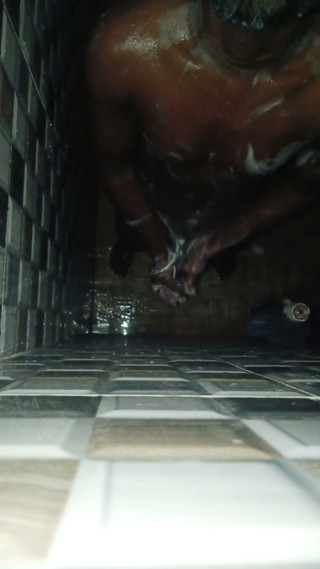 Hot Indian man bathing and playing and cleaning his big cock