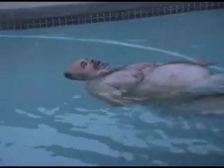 Santa relaxes in the pool