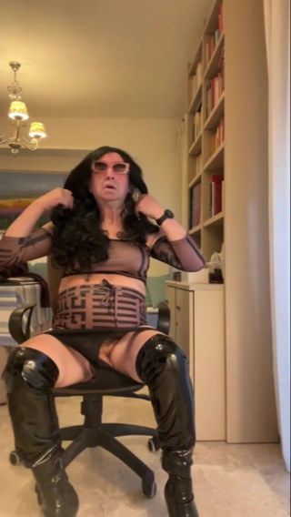 Hotdany65  The video shows a horny Spanish trans girl dressed in a short miniskirt top and black highheeled boots masturbating and cumming w | Tranny Update | Porn videos