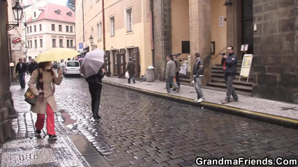 Two friends pick up old granny from the street
