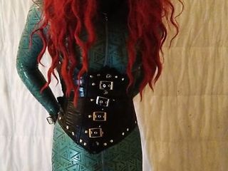 Latex redhead doll vibrates