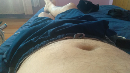 Man and his first masturbation of the day in close-up