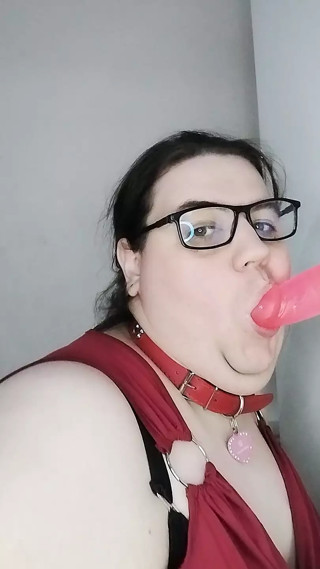 a transvestite trains sucked with a dildo