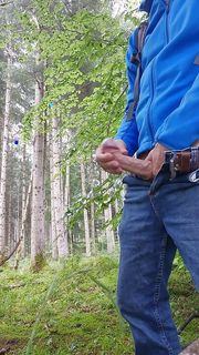 Horny in the forest while hiking and jerking off my hard cock in the rain - Part 1