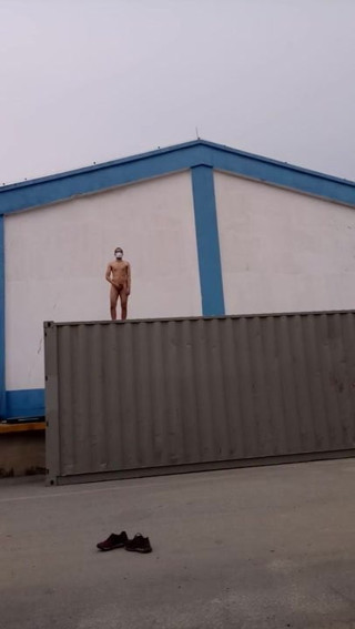 Naked on the cargo container