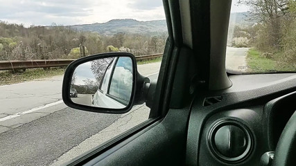 Blowing my load by the side of the road, in my car