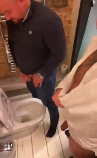 Lads piss together