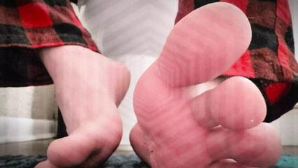 Obedient slave training licks feet and