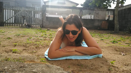 Wife sunbathing naked in front yard