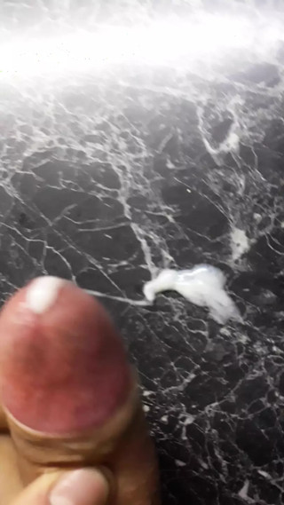 Masturbating in the kitchen