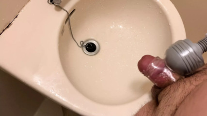 Small Penis With A Vibrator Sleeve Cumming And Pissing On Sink
