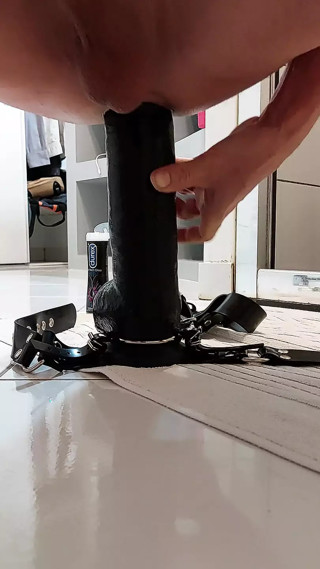 I have a blast in my ass with a big strap-on dildo