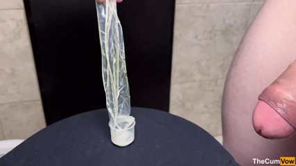 FILLING CONDOM WITH BIG LOAD AND PRECUM