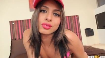 Cute Latin shemale stuffs her horny ass
