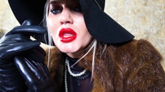 Femme fatale wearing fur coat and leather gloves