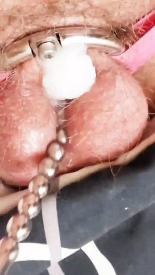 Flat Cage Chastity Cum with a Sounding Rod