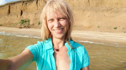 Alexa Cosmic transgirl swimming in the sea first time in teal combi dress thumbnail