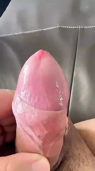 Uncut Malaysian Chinese playing with foreskin