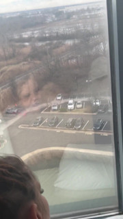 Giving Backshots While Looking Out of 12th Story Hotel