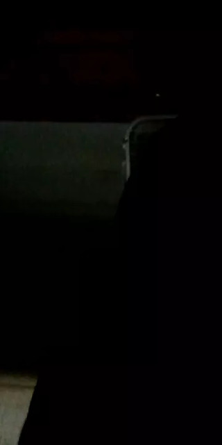 I wore a condom in my bed while naked in black shaded room