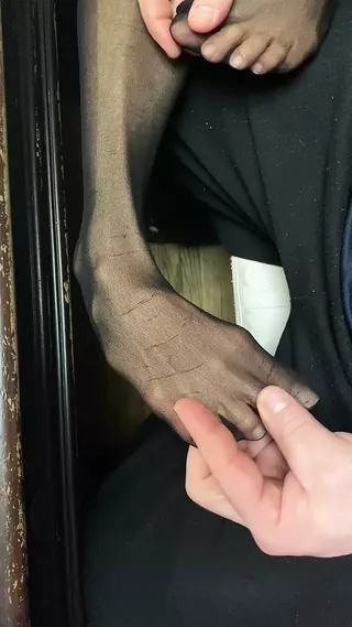 Sexy legs in nylon with tiny feet