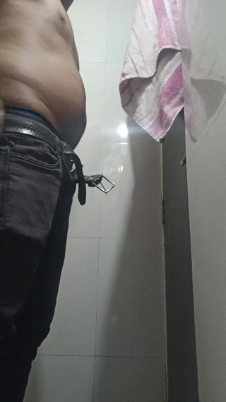 Auto rickshaw man getting shower thumbnail