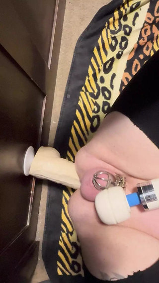 Sissy in chastity with hitachi cumming