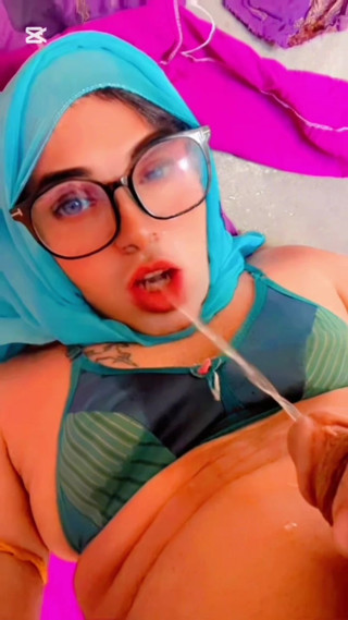 Beautiful Hijabi Transgender Peeing in Mouth thumbnail