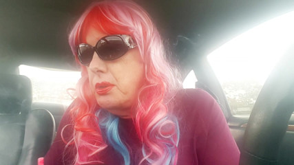 Mature TG CD Rainbow Wig Leather Gloves Smoking VS120s like a PRO in her car thumbnail