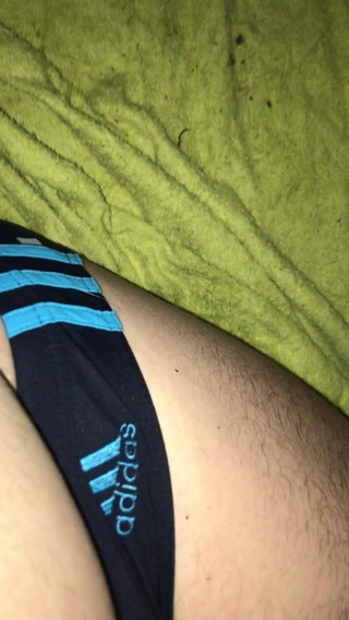 Me in Adidas swim brief dark blue with light blue stripes