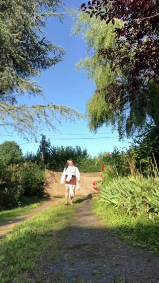 In an outfit with a little brown skirt for an evening. thumbnail