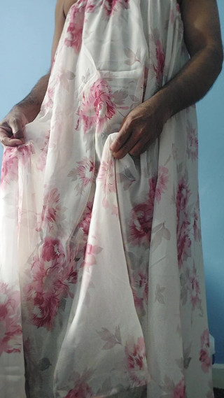 I'm masterbating in a flowery flowing silky seethrough fleard skirt and cum