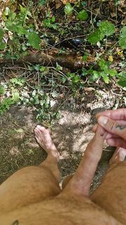 Me pissing naked in the forrest with my uncut cock
