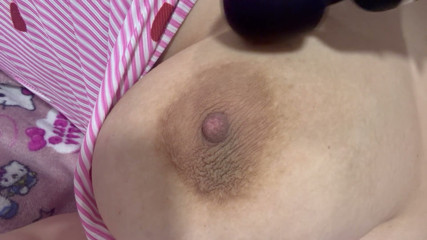 Mom plays with her vibrator and her huge tits