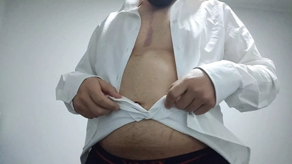 Chubby guy take off his clothes and play with his cock