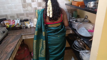 Housewife works at home with stepsister and her husband