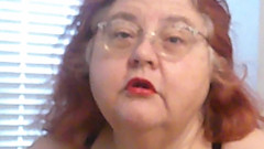 Mature BBW Redhead Nurse Vicki Talks to You as She Makes a Lipstick Applying Video for You!